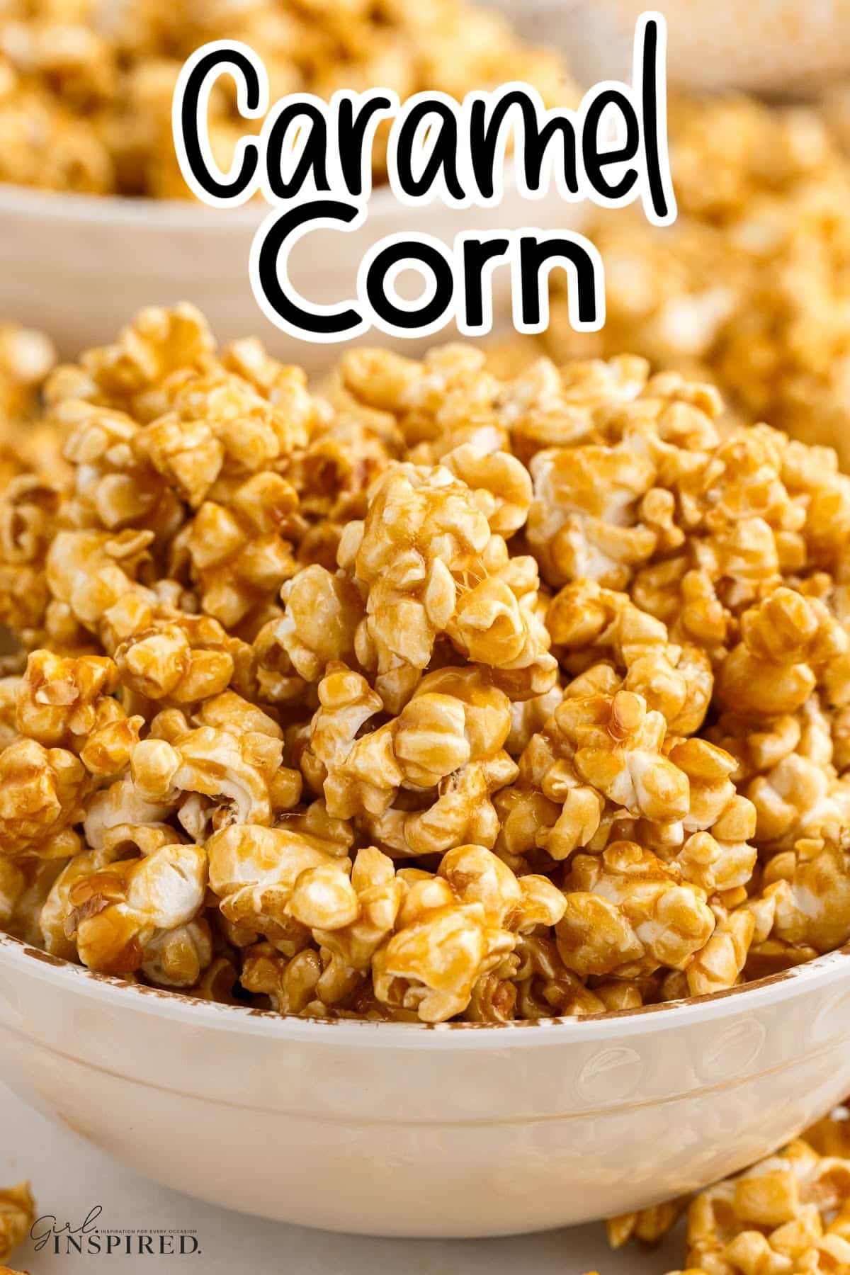 Bowl spilling over with caramel corn and text title.
