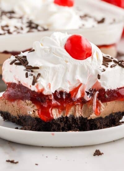 A slice of Chocolate Cherry Lush with a bite taken out of it.