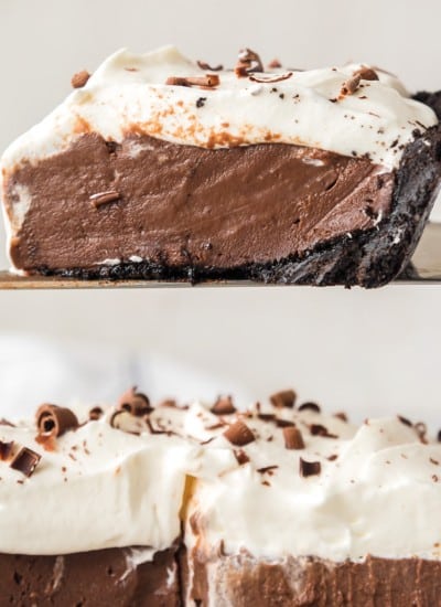 slice of chocolate cream pie on spatula over pie plate.