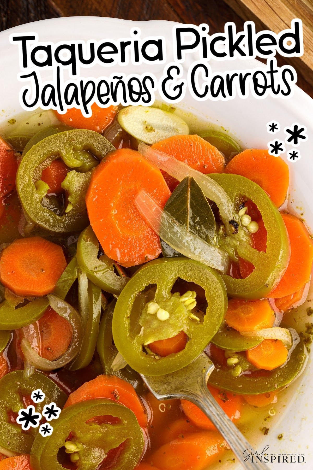 Overhead close up of Pickled Jalapeños and Carrots with text overlay.